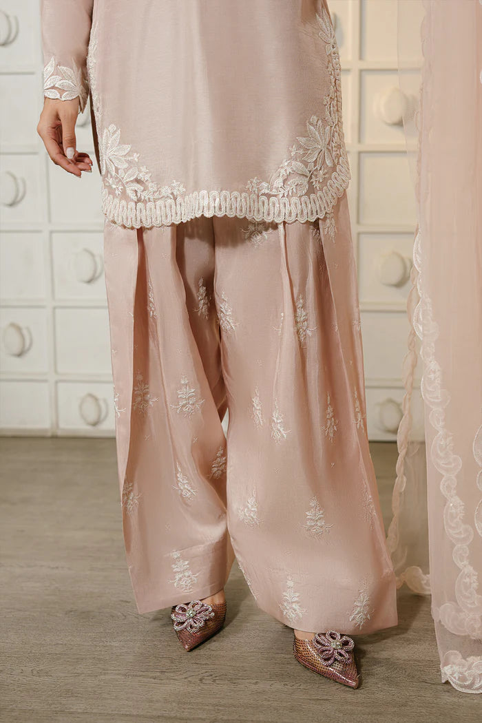 Model wearing blush pink NORA-SREP1-04 from Saira Rizwan Luxury Lawn Eid Edit '25, perfect for Pakistani luxury pret and online shopping in UK.