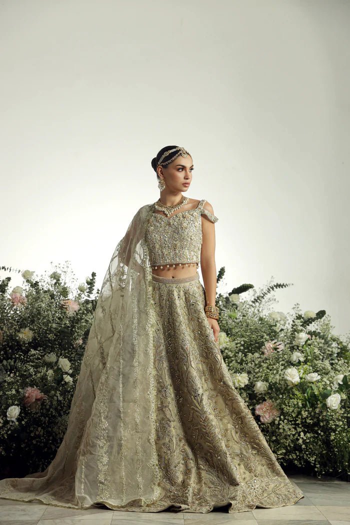 Model wearing Hansel from Mysie by Tahira's Arzu Bridals '24 collection in sophisticated beige. Wedding wear, bridal, Pakistani clothes online in UK.