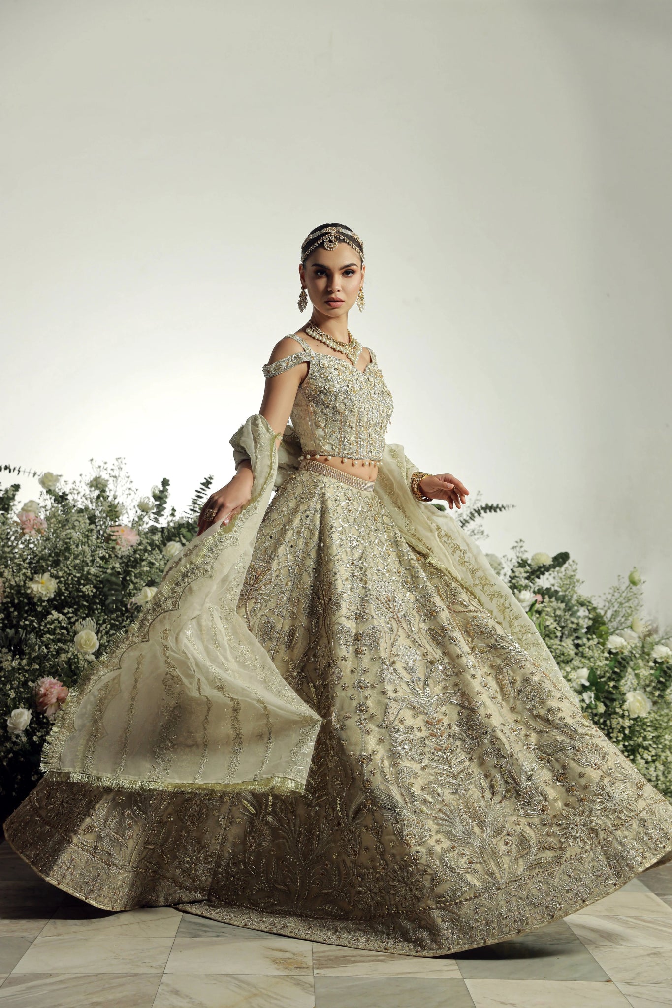 Model wearing Hansel from Mysie by Tahira's Arzu Bridals '24 collection in sophisticated beige. Wedding wear, bridal, Pakistani clothes online in UK.