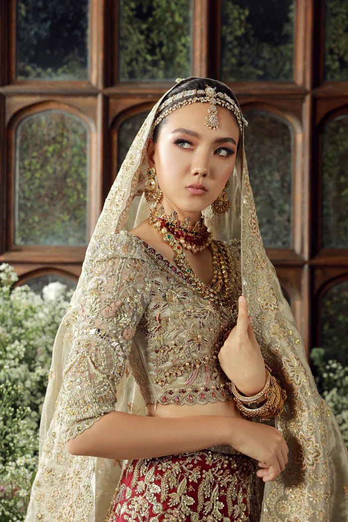Model wearing Irtiqa from Mysie by Tahira's Arzu Bridals '24 collection in elegant ivory. Wedding wear, bridal, Pakistani clothes online in UK.