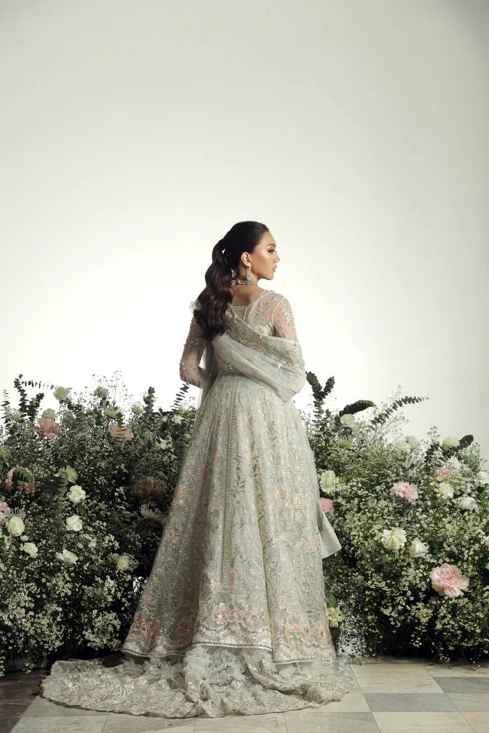Model wearing Ruva from Mysie by Tahira's Arzu Bridals '24 collection in elegant ivory. Wedding wear, bridal, Pakistani clothes online in UK.