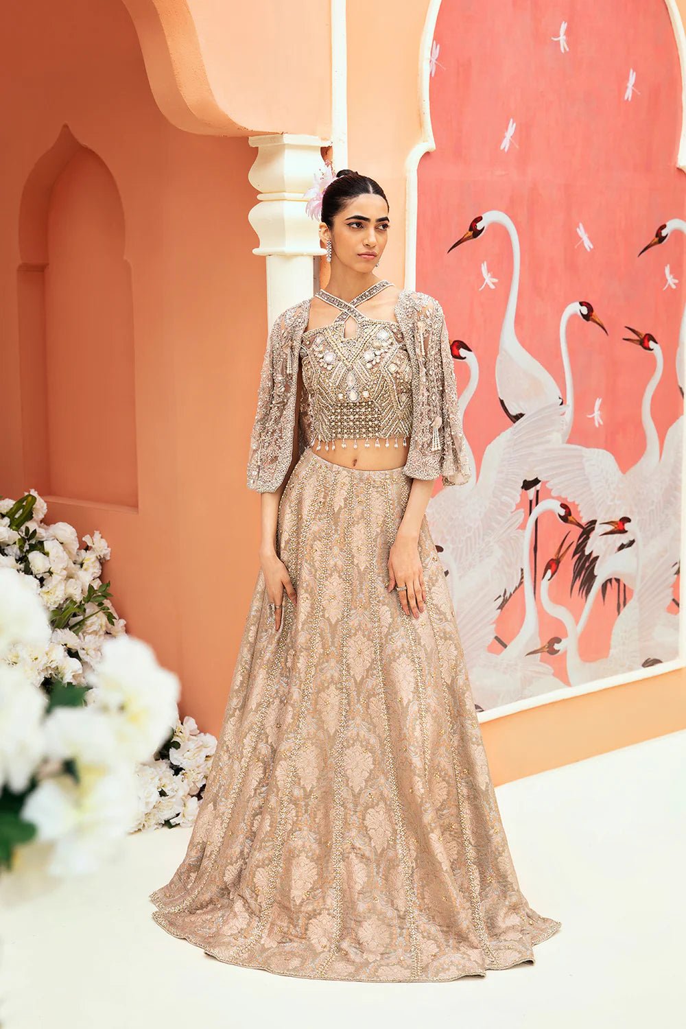 Model in a Mysie By Tahira Ehmaal gown, a stunning Pakistani bridal attire in the UK.