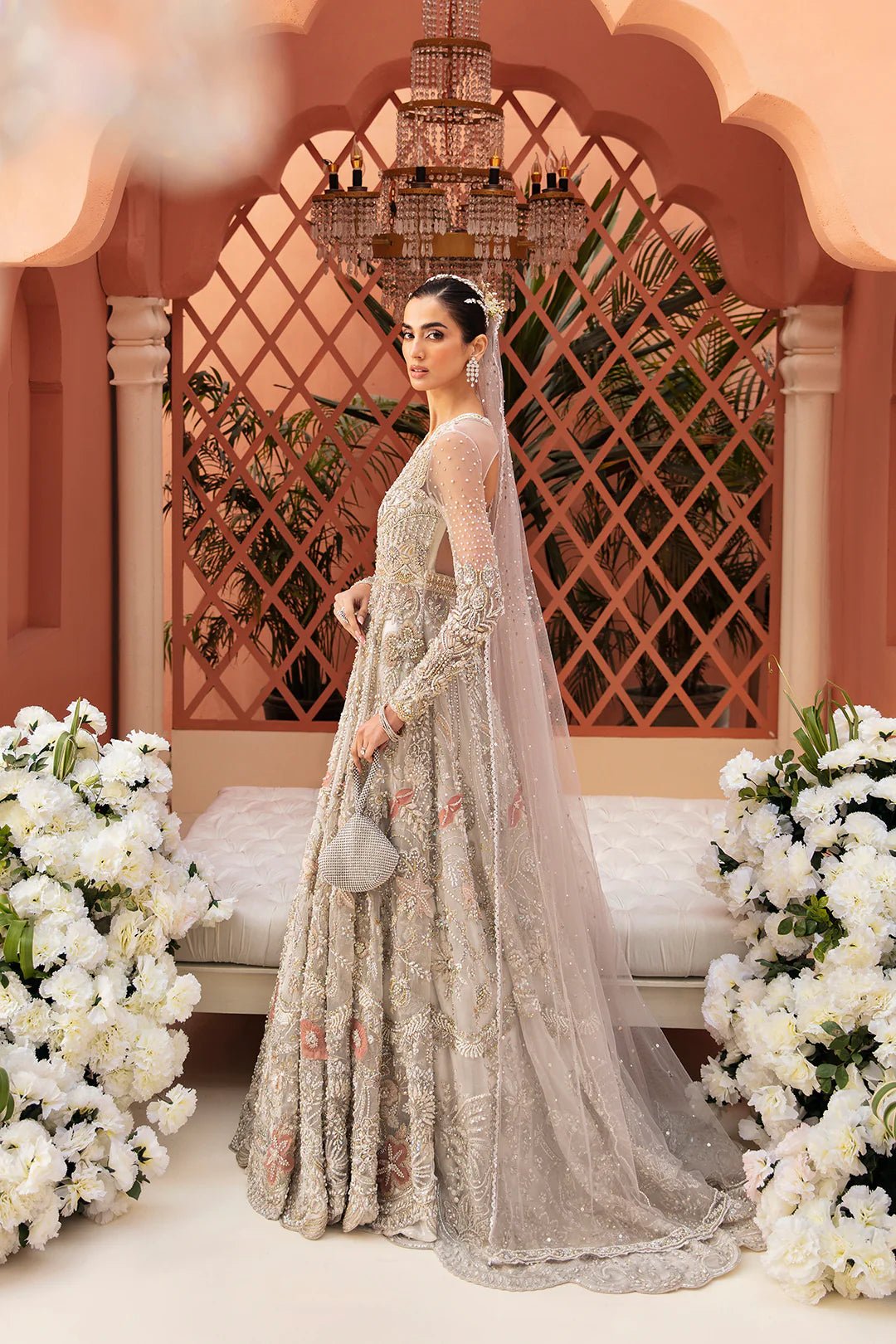 Model wearing Rylee dress from Mysie by Tahira, Poetique Bridal 24 collection. Pakistani clothes online in UK.
