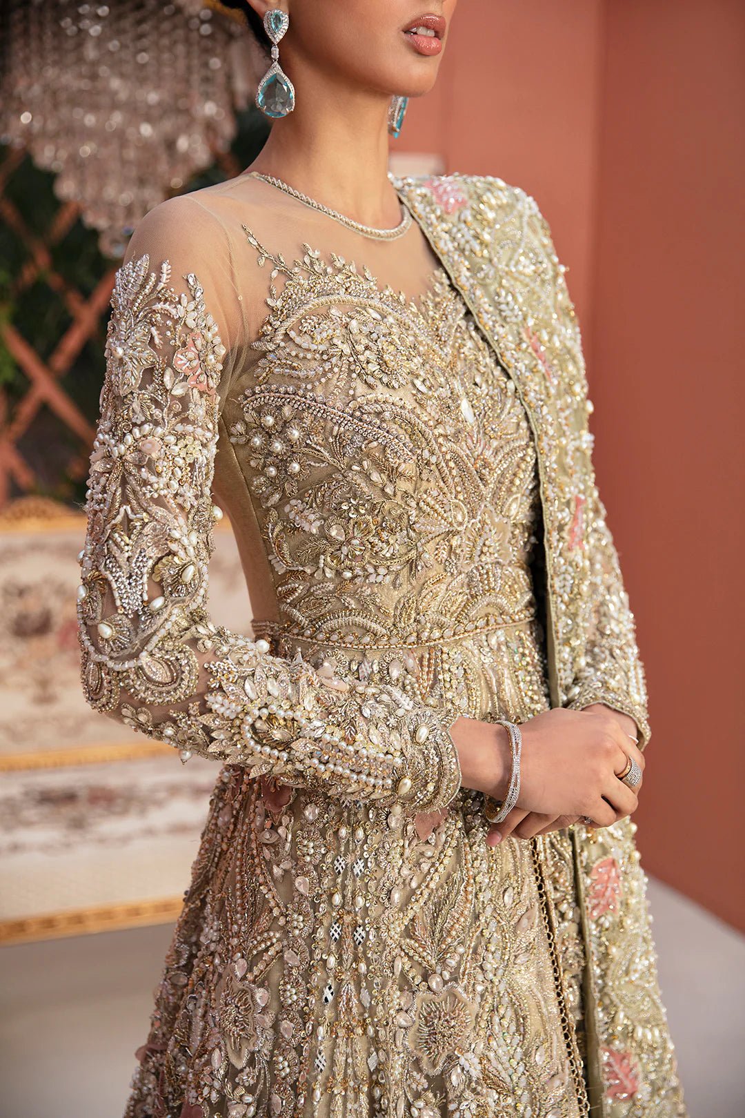 Model wearing Savarna dress from Mysie by Tahira, Poetique Bridal 24 collection. Pakistani clothes online in UK.