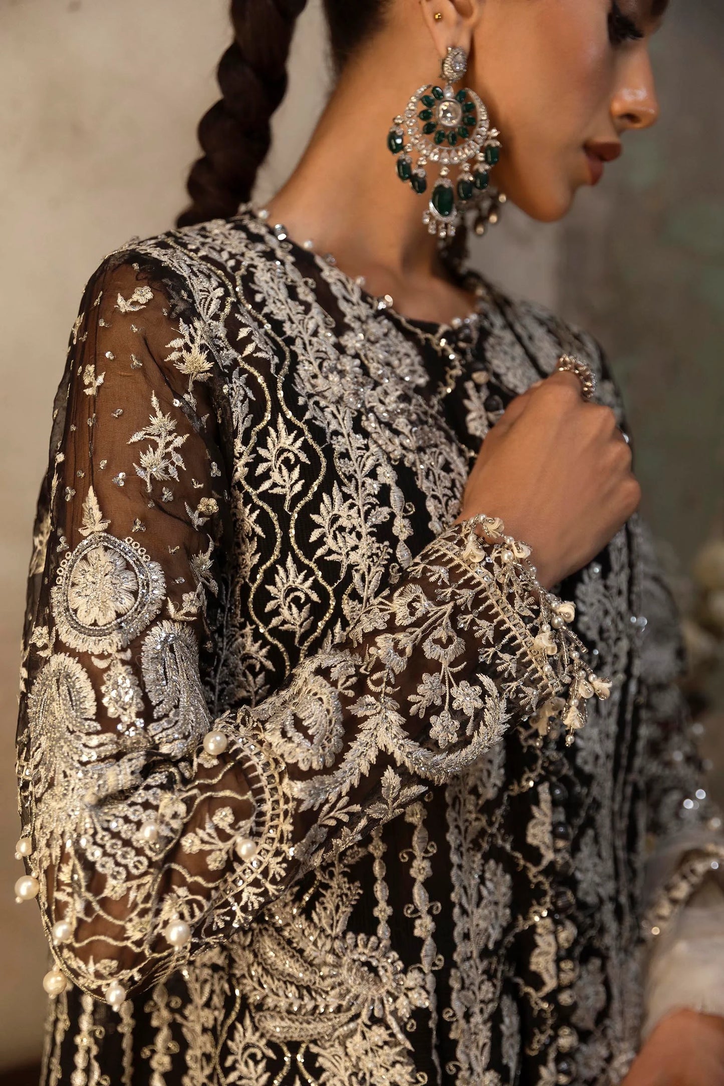 Model wearing black and silver Sana Safinaz N251-003-3CX outfit with intricate embroidery and ivory net dupatta, Pakistani Luxury pret, Pakistani clothes online in UK.