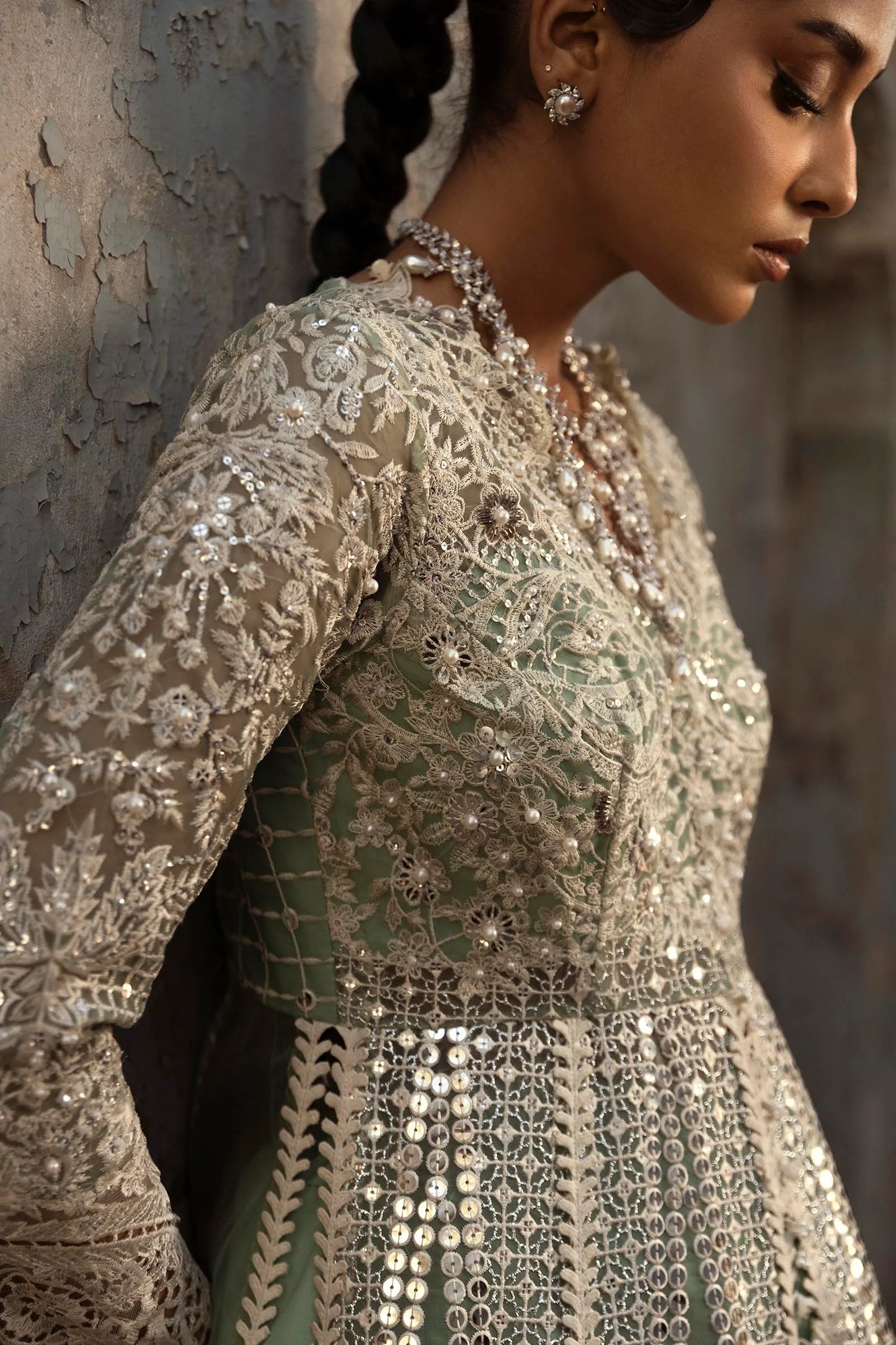 Model wearing mint green Sana Safinaz N251-005-3CX heavily embroidered gown with mirror work, Pakistani Luxury pret, Pakistani clothes online in UK.