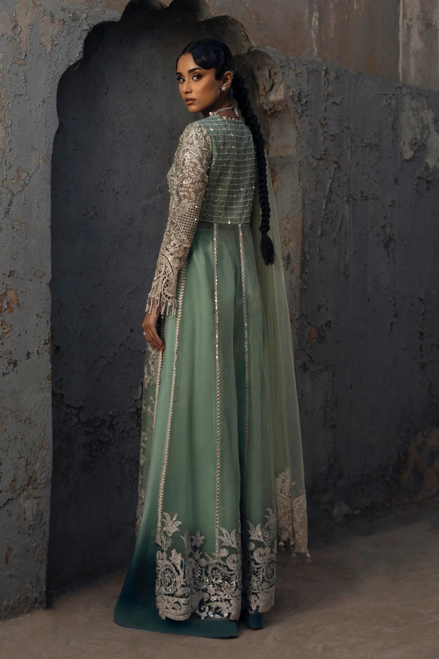 Model wearing mint green Sana Safinaz N251-005-3CX heavily embroidered gown with mirror work, Pakistani Luxury pret, Pakistani clothes online in UK.