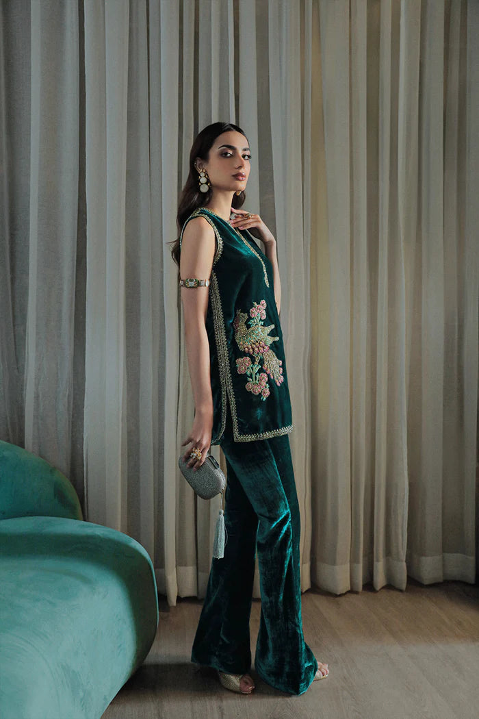 Model in emerald Simone dress from Saira Rizwan Luxury Pret Riona '23, an icon of Pakistani chic in the UK.
