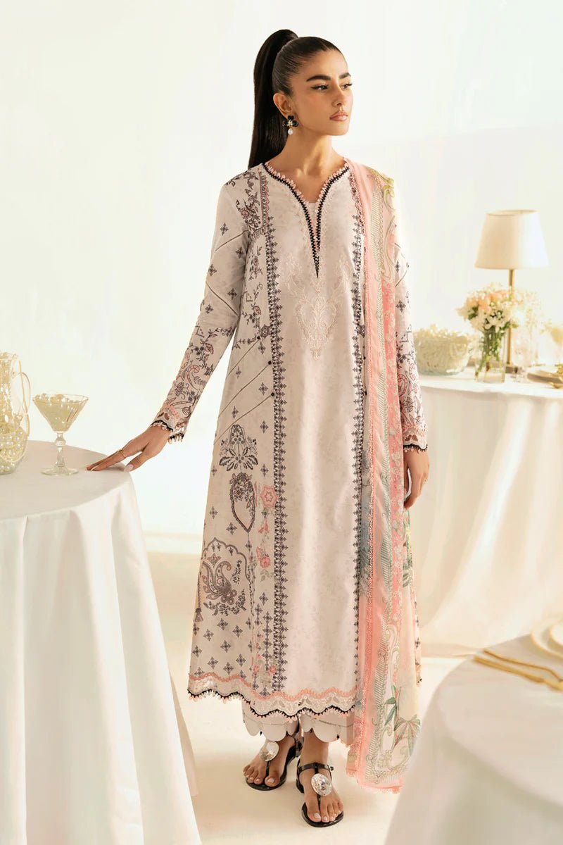 Model wearing Qalamkar Qprints '25 PQ - 09 Lyra dress in white with intricate embroidery and pastel detailing. Shop Pakistani clothes online in the UK now.
