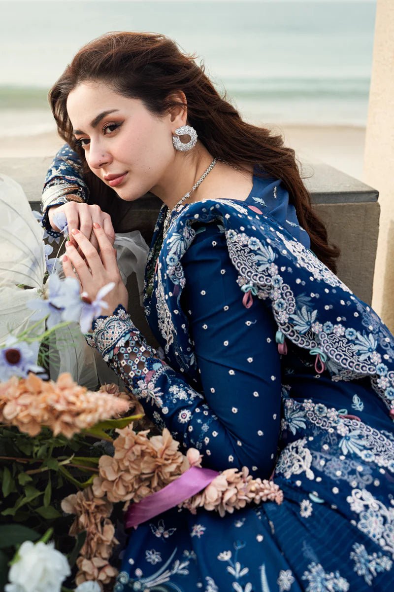Model wearing Qalamkar Sahil Luxury Lawn '25 FK - 05 AURORA dress in navy blue with intricate embroidery. Shop Pakistani clothes online in the UK now.