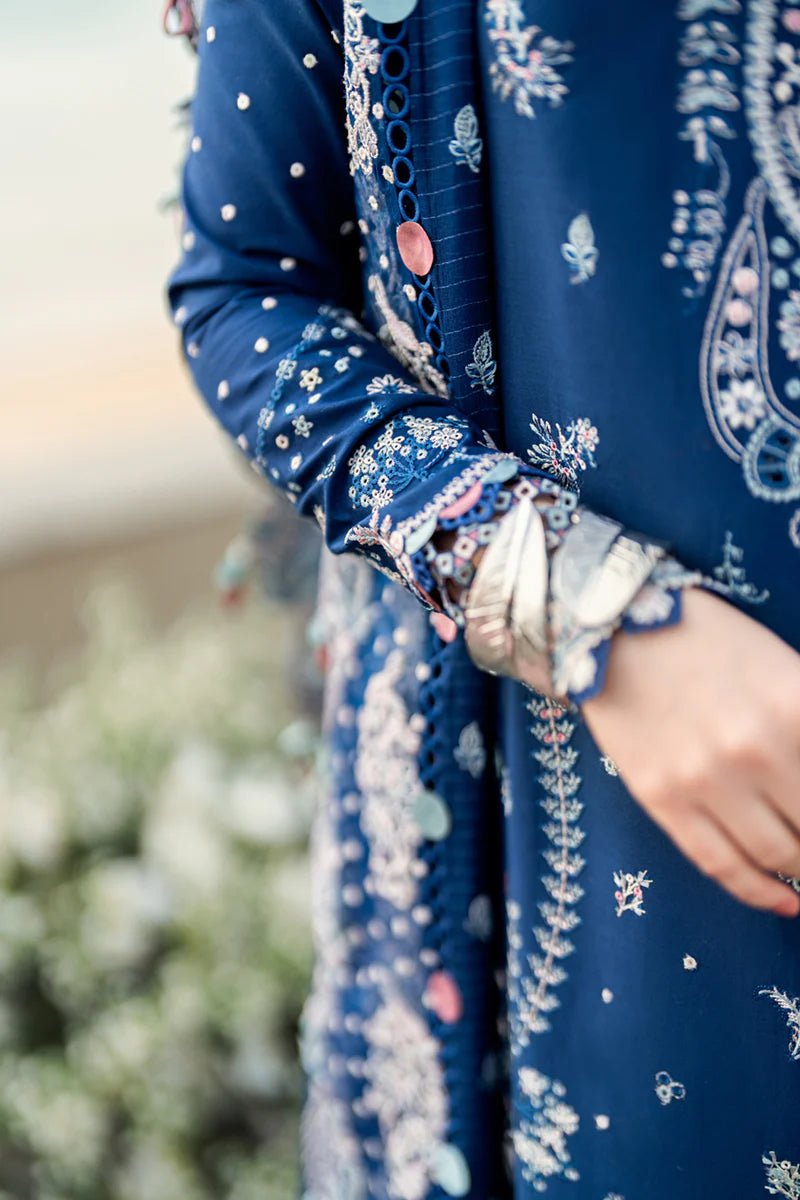 Model wearing Qalamkar Sahil Luxury Lawn '25 FK - 05 AURORA dress in navy blue with intricate embroidery. Shop Pakistani clothes online in the UK now.