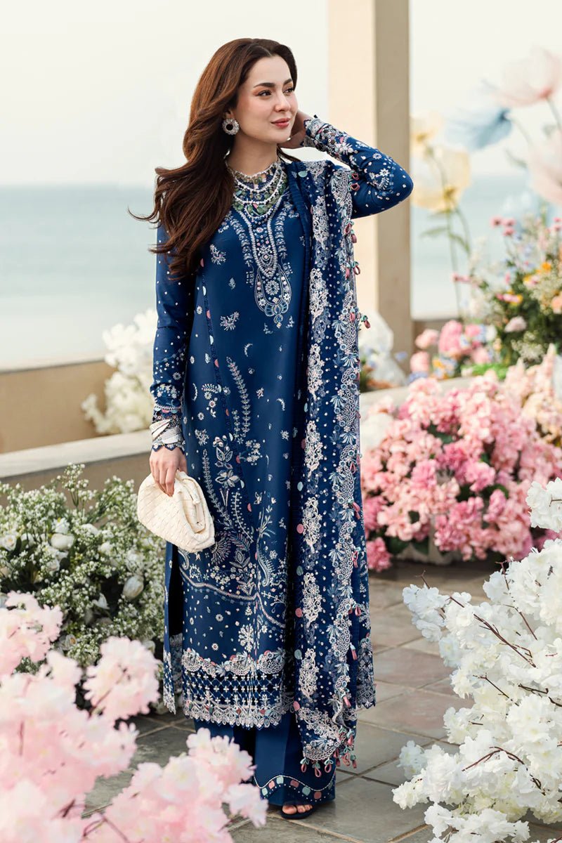 Model wearing Qalamkar Sahil Luxury Lawn '25 FK - 05 AURORA dress in navy blue with intricate embroidery. Shop Pakistani clothes online in the UK now.