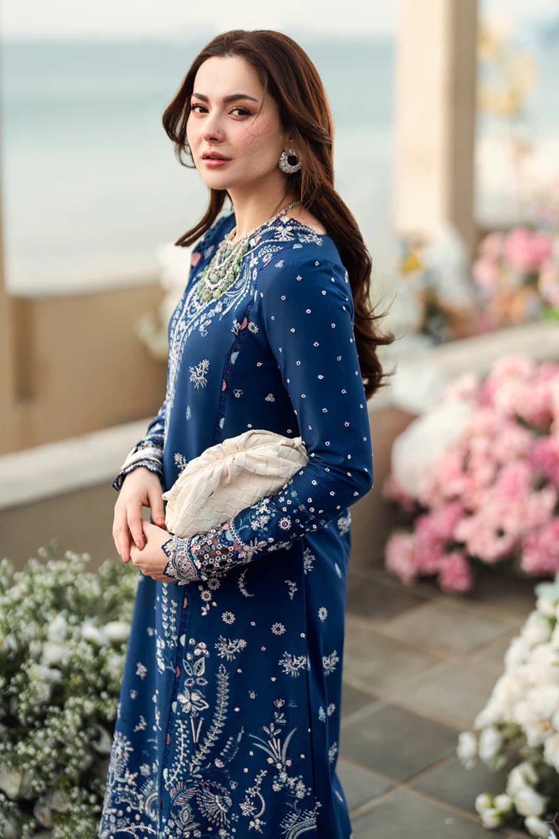 Model wearing Qalamkar Sahil Luxury Lawn '25 FK - 05 AURORA dress in navy blue with intricate embroidery. Shop Pakistani clothes online in the UK now.