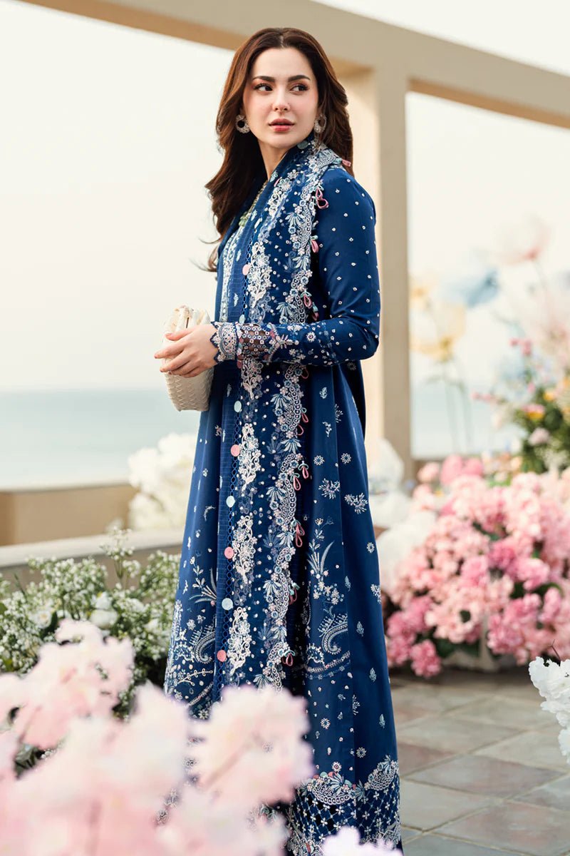 Model wearing Qalamkar Sahil Luxury Lawn '25 FK - 05 AURORA dress in navy blue with intricate embroidery. Shop Pakistani clothes online in the UK now.