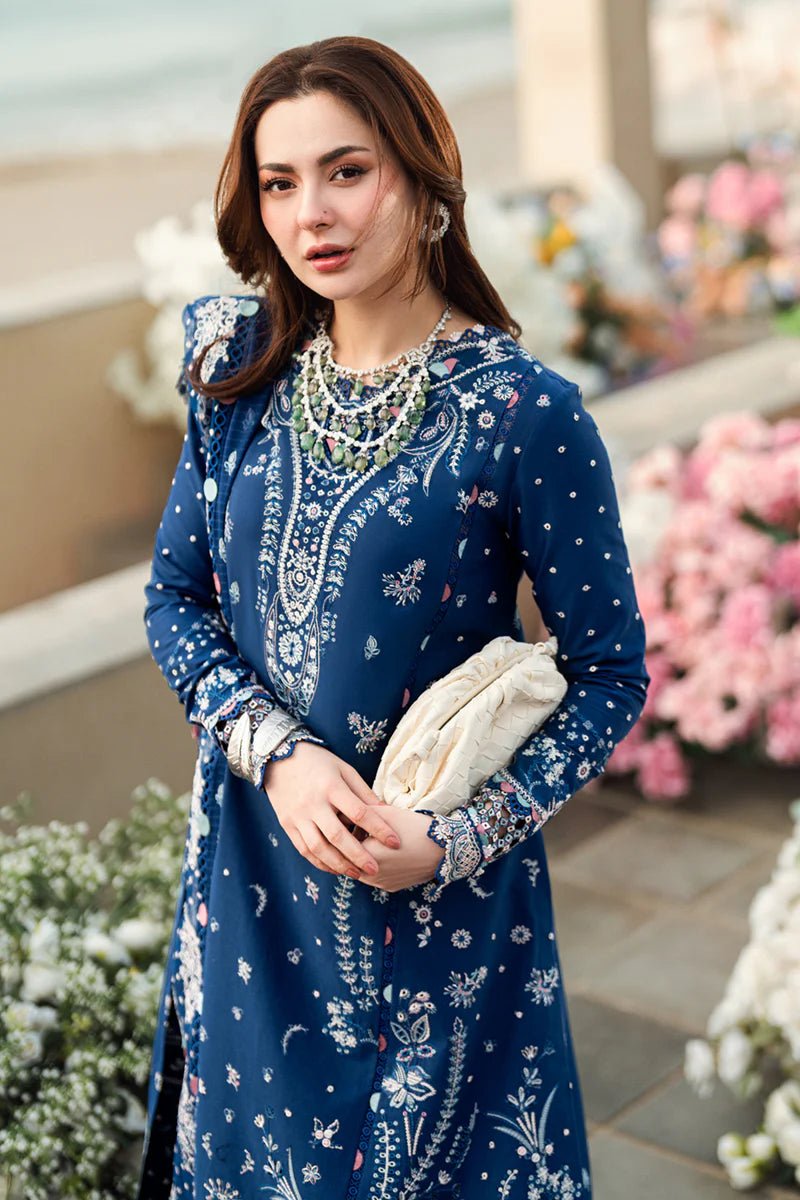 Model wearing Qalamkar Sahil Luxury Lawn '25 FK - 05 AURORA dress in navy blue with intricate embroidery. Shop Pakistani clothes online in the UK now.