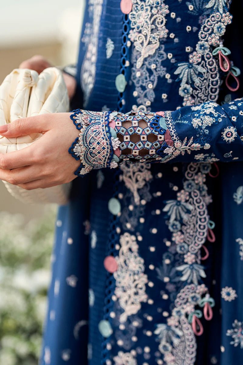 Model wearing Qalamkar Sahil Luxury Lawn '25 FK - 05 AURORA dress in navy blue with intricate embroidery. Shop Pakistani clothes online in the UK now.