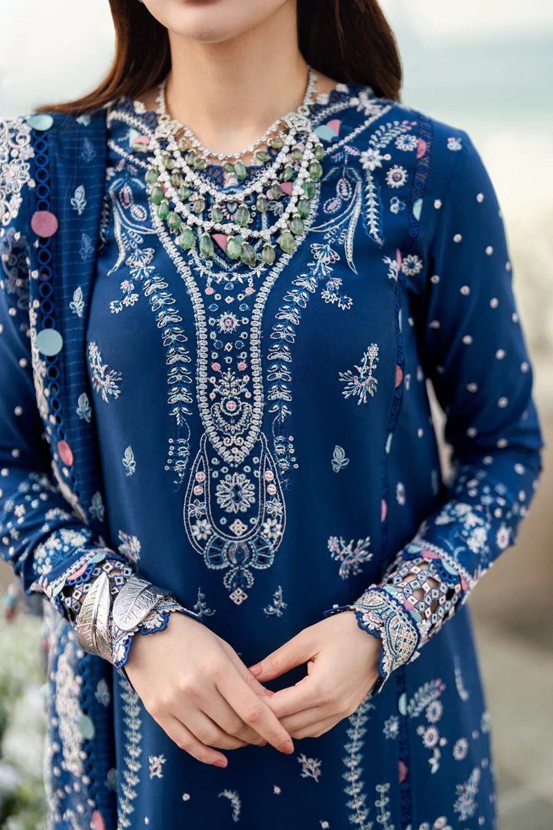 Model wearing Qalamkar Sahil Luxury Lawn '25 FK - 05 AURORA dress in navy blue with intricate embroidery. Shop Pakistani clothes online in the UK now.