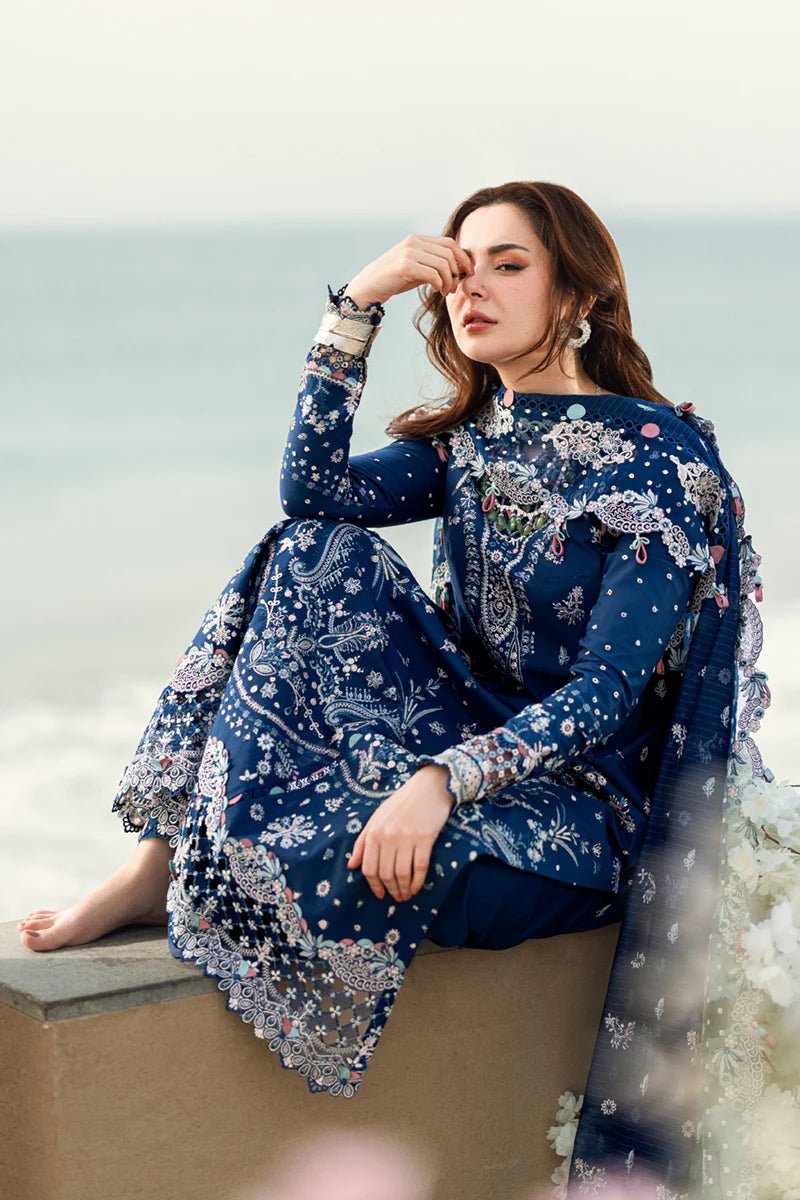 Model wearing Qalamkar Sahil Luxury Lawn '25 FK - 05 AURORA dress in navy blue with intricate embroidery. Shop Pakistani clothes online in the UK now.