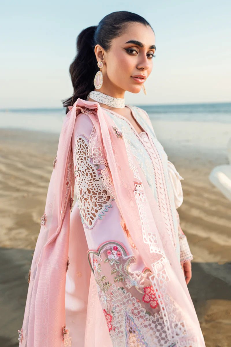 Model wearing Qalamkar Sahil Luxury Lawn '25 FK - 08 REEM dress in pastel pink with delicate embroidery. Shop Pakistani clothes online in the UK now.