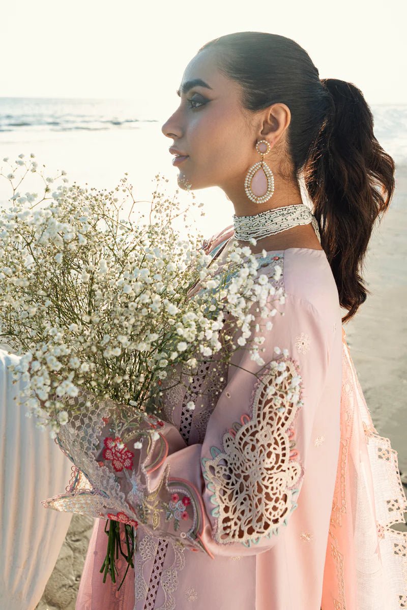 Model wearing Qalamkar Sahil Luxury Lawn '25 FK - 08 REEM dress in pastel pink with delicate embroidery. Shop Pakistani clothes online in the UK now.