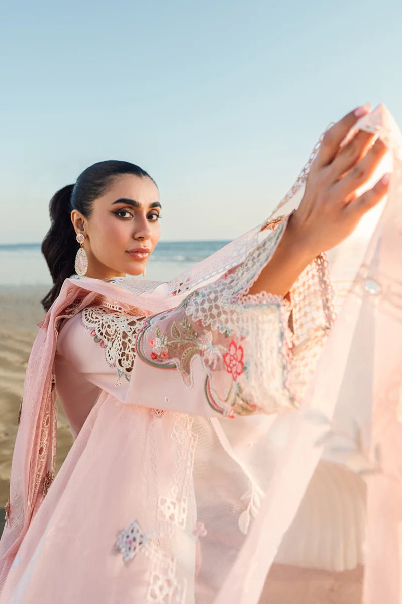 Model wearing Qalamkar Sahil Luxury Lawn '25 FK - 08 REEM dress in pastel pink with delicate embroidery. Shop Pakistani clothes online in the UK now.