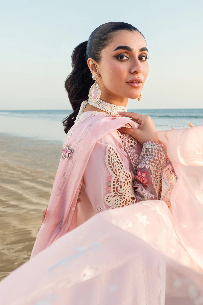 Model wearing Qalamkar Sahil Luxury Lawn '25 FK - 08 REEM dress in pastel pink with delicate embroidery. Shop Pakistani clothes online in the UK now.