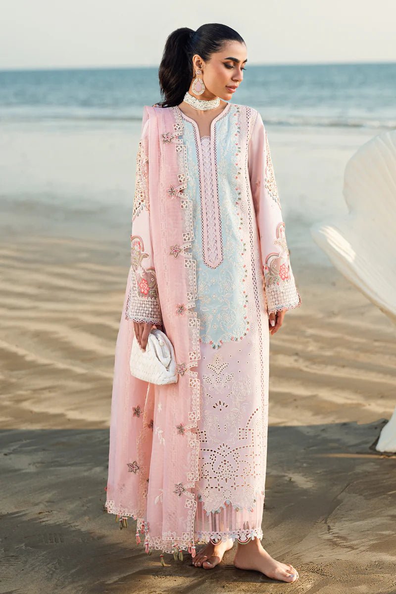 Model wearing Qalamkar Sahil Luxury Lawn '25 FK - 08 REEM dress in pastel pink with delicate embroidery. Shop Pakistani clothes online in the UK now.