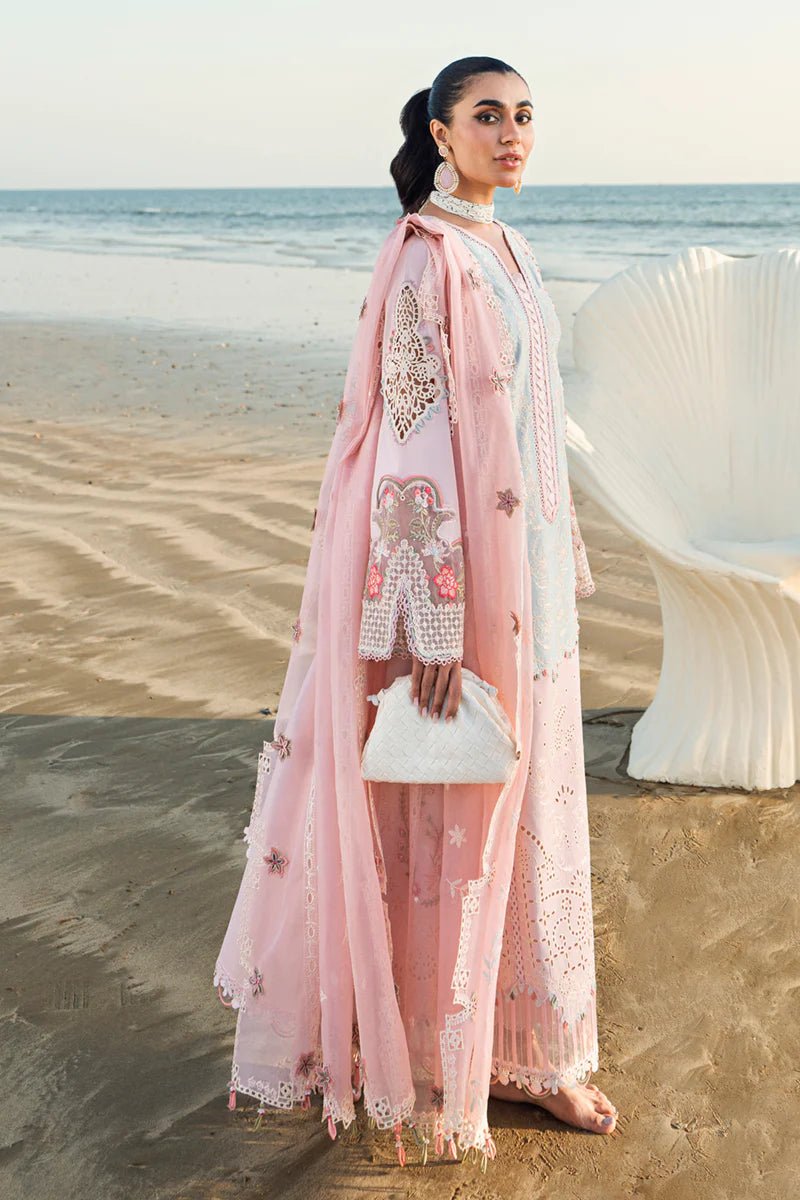 Model wearing Qalamkar Sahil Luxury Lawn '25 FK - 08 REEM dress in pastel pink with delicate embroidery. Shop Pakistani clothes online in the UK now.