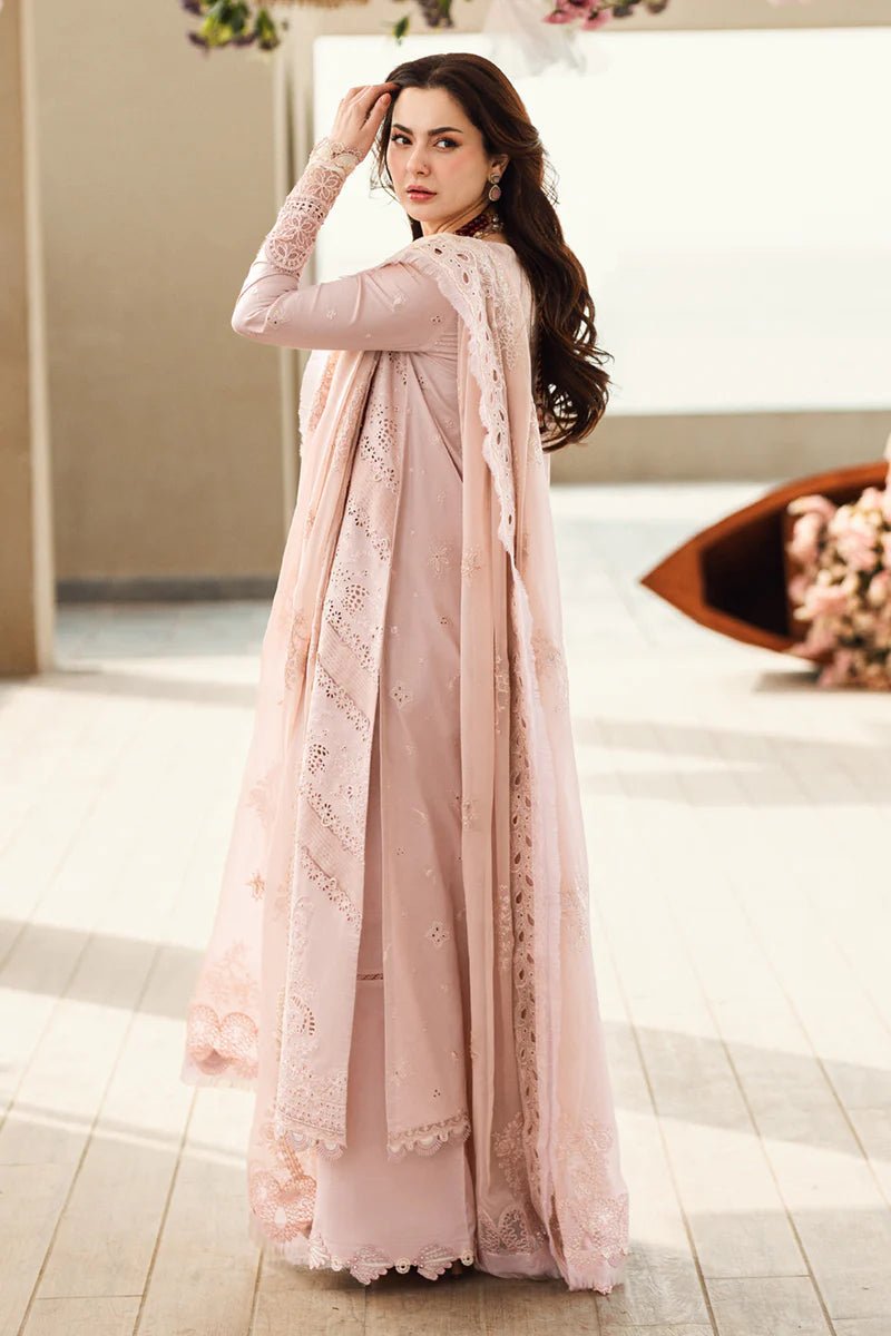 Model wearing Qalamkar Sahil Luxury Lawn '25 FK - 10 ZOE dress in soft pink with intricate embroidery. Shop Pakistani clothes online in the UK now.