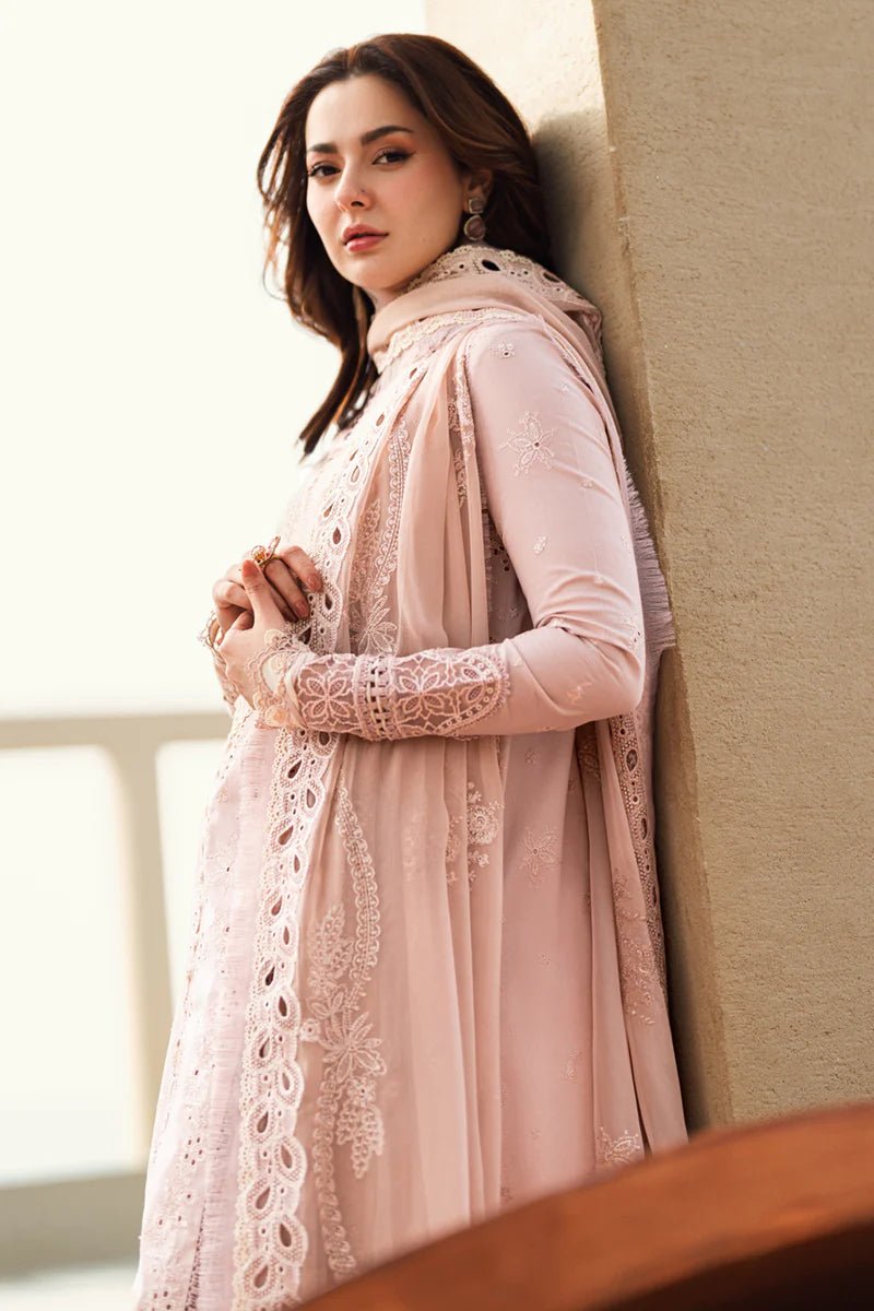 Model wearing Qalamkar Sahil Luxury Lawn '25 FK - 10 ZOE dress in soft pink with intricate embroidery. Shop Pakistani clothes online in the UK now.