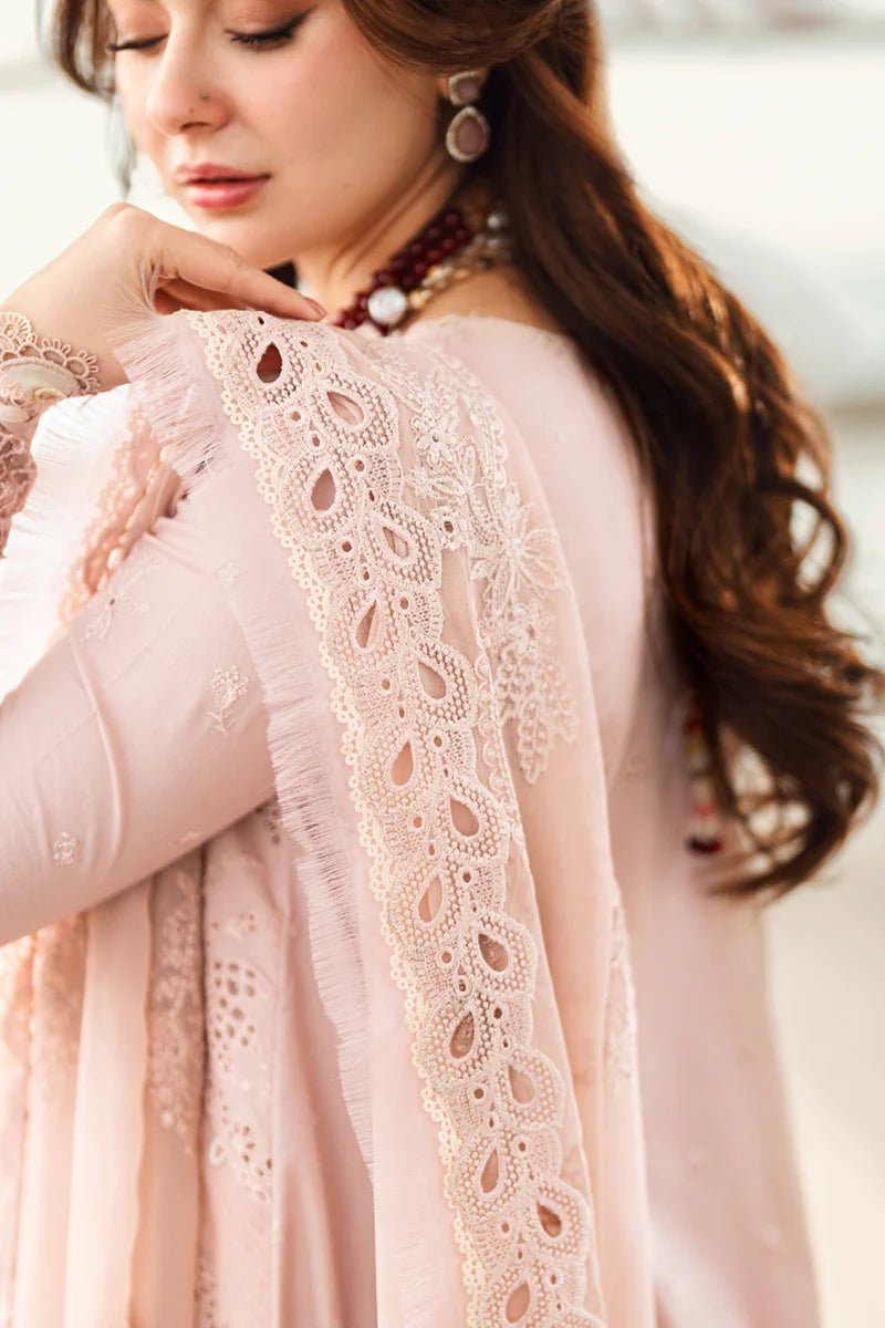 Model wearing Qalamkar Sahil Luxury Lawn '25 FK - 10 ZOE dress in soft pink with intricate embroidery. Shop Pakistani clothes online in the UK now.