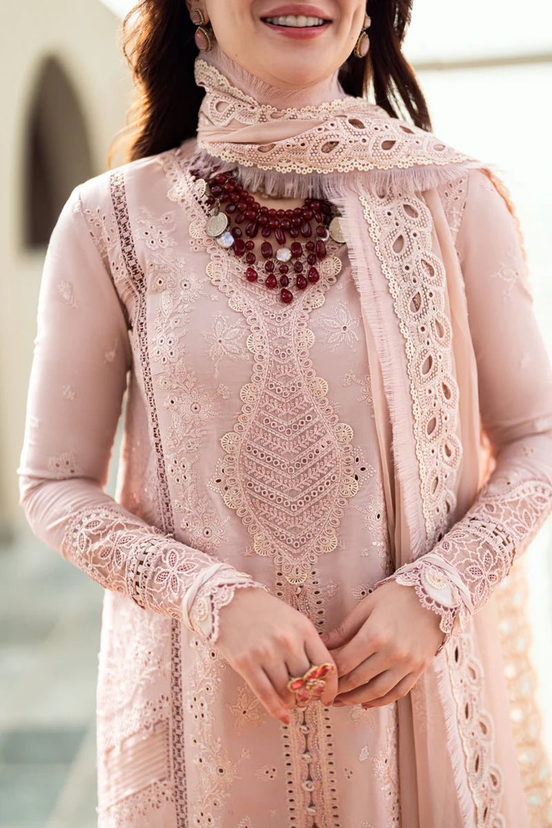 Model wearing Qalamkar Sahil Luxury Lawn '25 FK - 10 ZOE dress in soft pink with intricate embroidery. Shop Pakistani clothes online in the UK now.