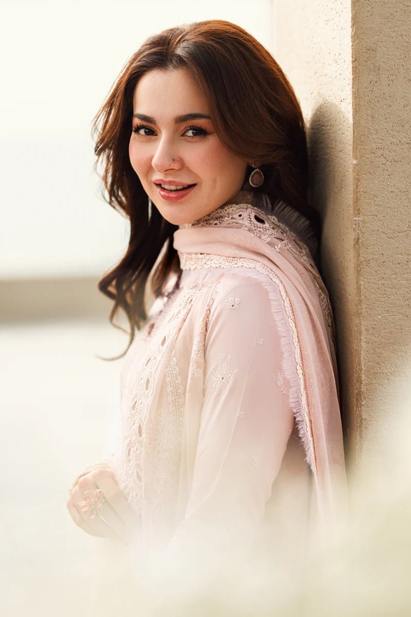 Model wearing Qalamkar Sahil Luxury Lawn '25 FK - 10 ZOE dress in soft pink with intricate embroidery. Shop Pakistani clothes online in the UK now.