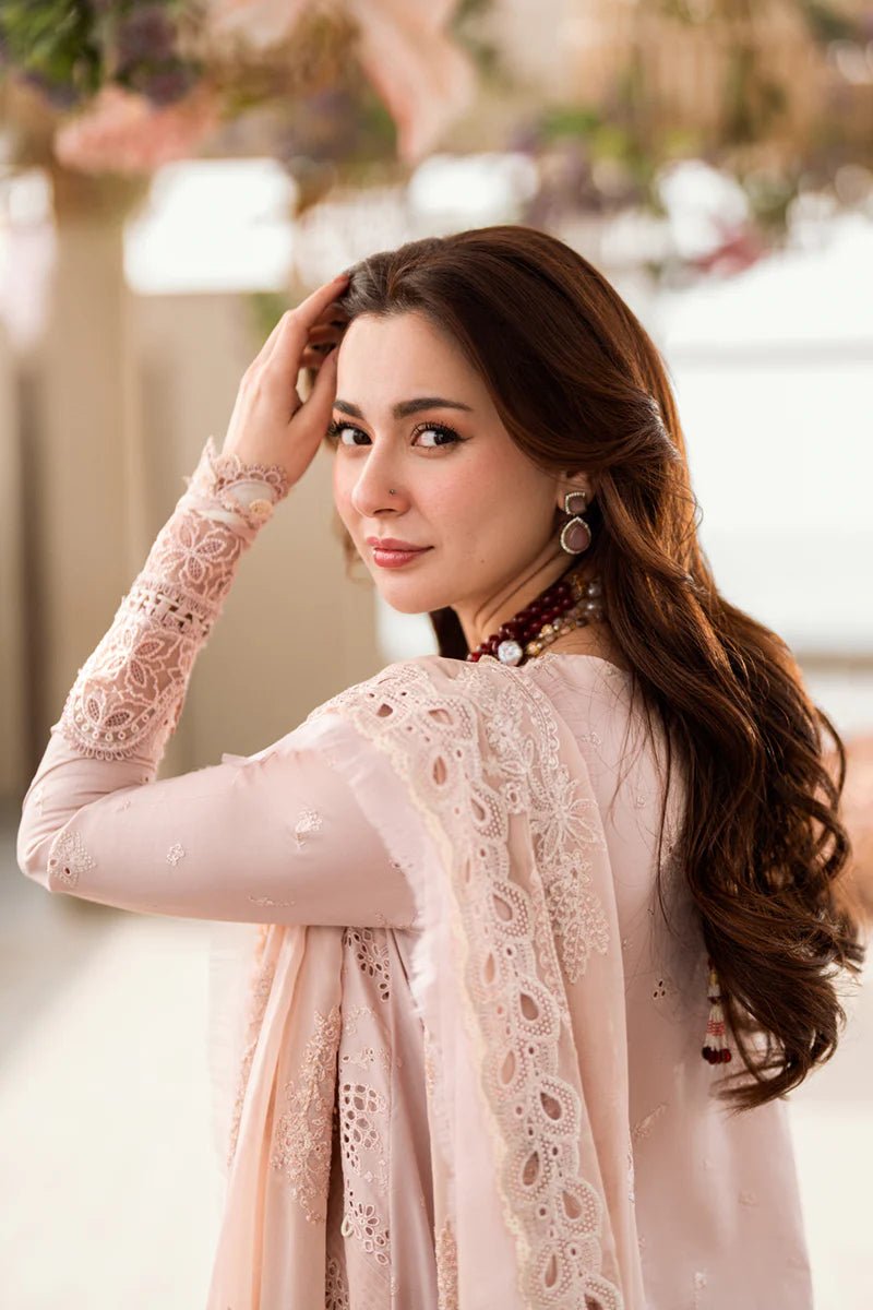 Model wearing Qalamkar Sahil Luxury Lawn '25 FK - 10 ZOE dress in soft pink with intricate embroidery. Shop Pakistani clothes online in the UK now.