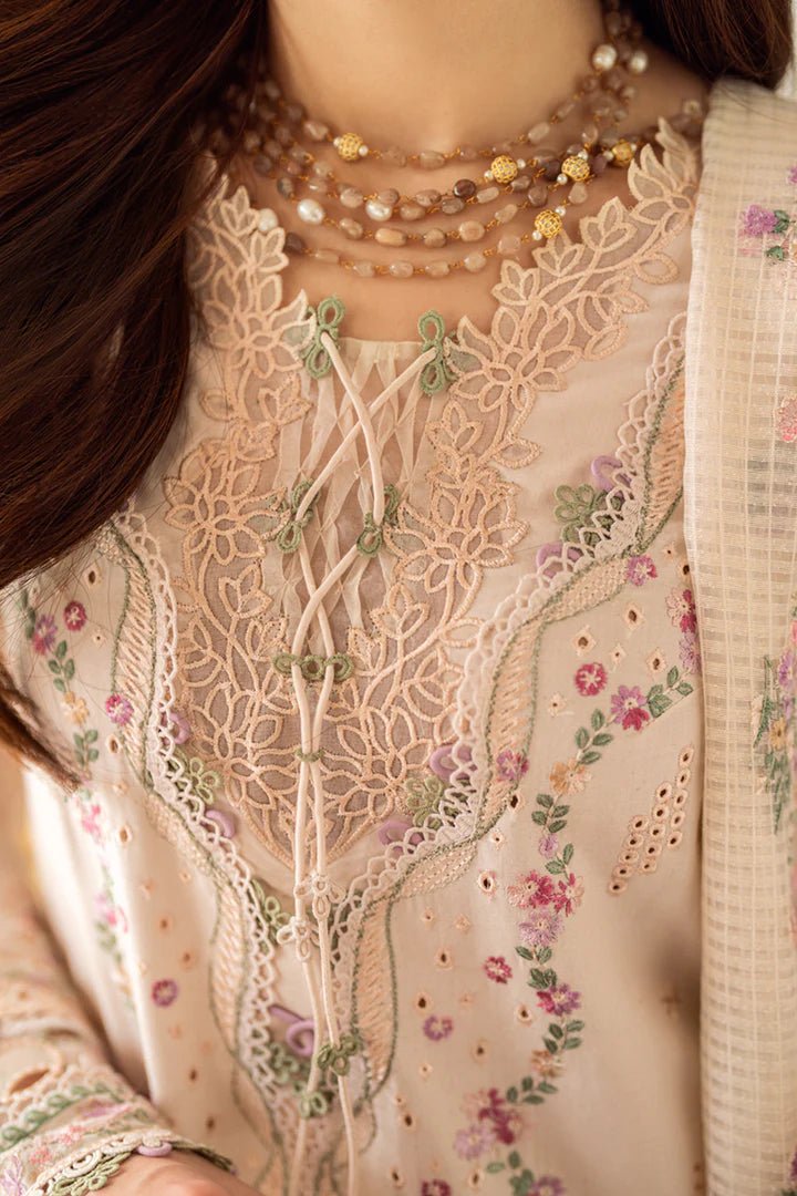 Model wearing pastel pink FK - 12 LILY dress from Qalamkar, a stylish Pakistani lawn suit perfect for summer clothes and lawn suits in the UK.