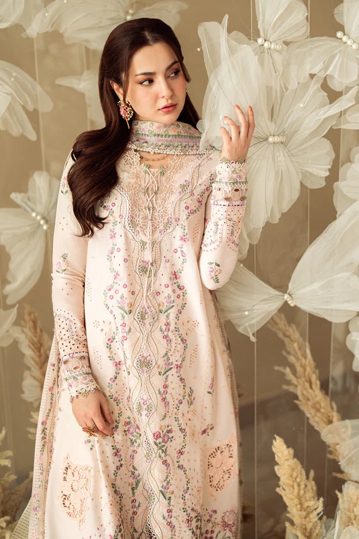 Model wearing pastel pink FK - 12 LILY dress from Qalamkar, a stylish Pakistani lawn suit perfect for summer clothes and lawn suits in the UK.