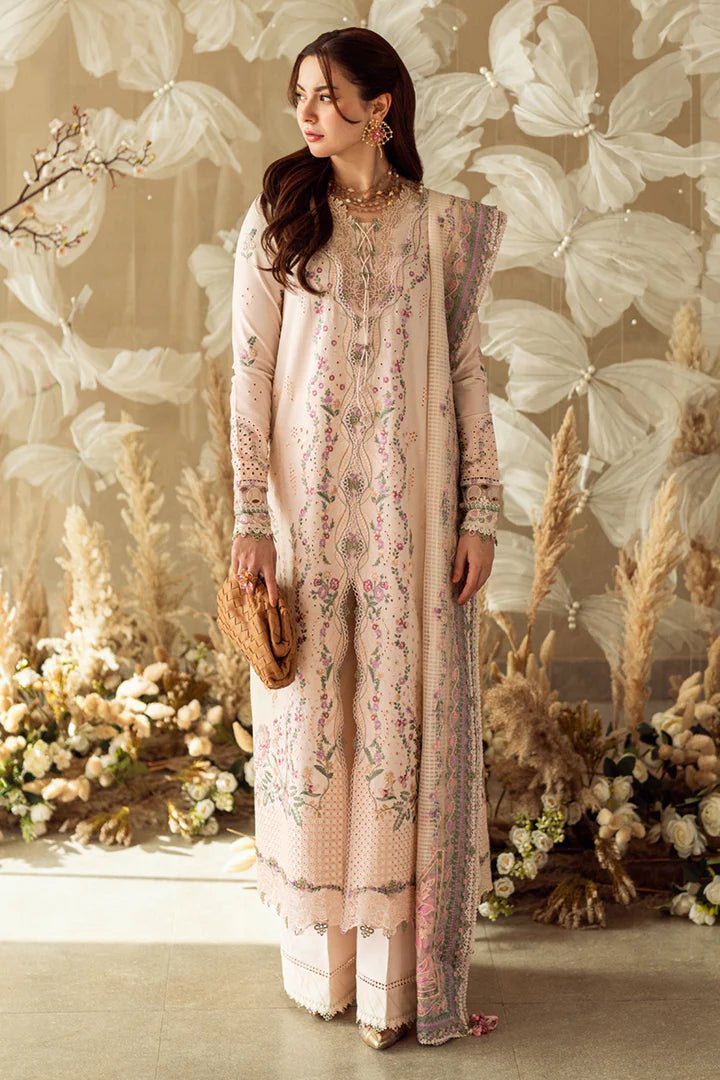 Model wearing pastel pink FK - 12 LILY dress from Qalamkar, a stylish Pakistani lawn suit perfect for summer clothes and lawn suits in the UK.