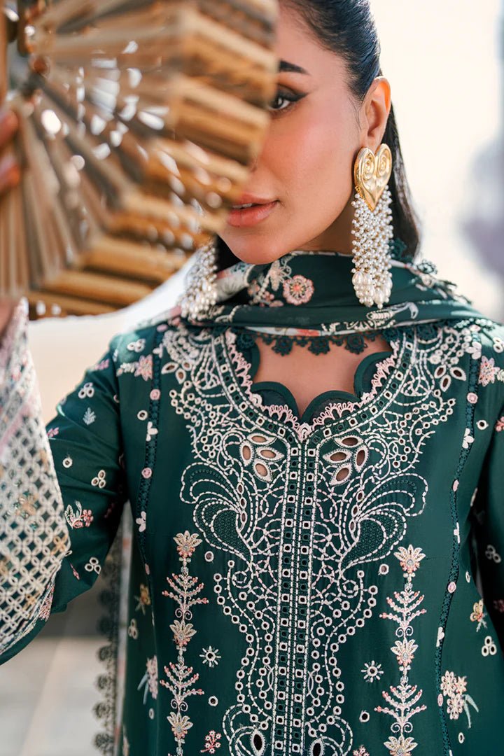 Model wearing deep green FK - 13 ELIZA dress from Qalamkar, a stylish Pakistani lawn suit perfect for summer clothes and lawn suits in the UK.