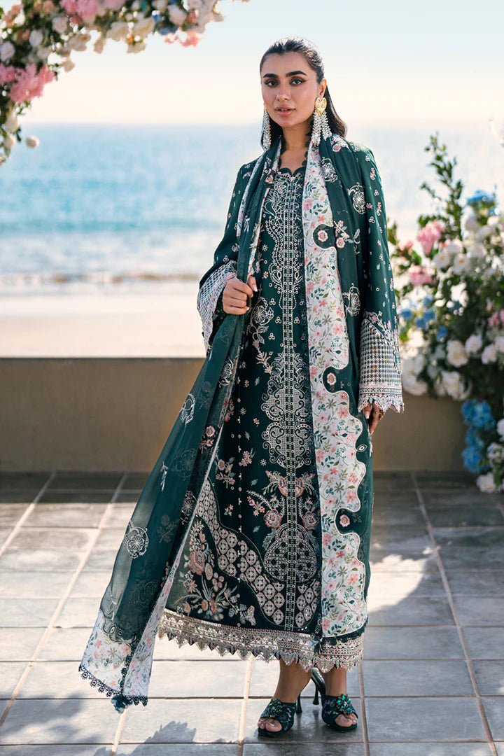 Model wearing deep green FK - 13 ELIZA dress from Qalamkar, a stylish Pakistani lawn suit perfect for summer clothes and lawn suits in the UK.