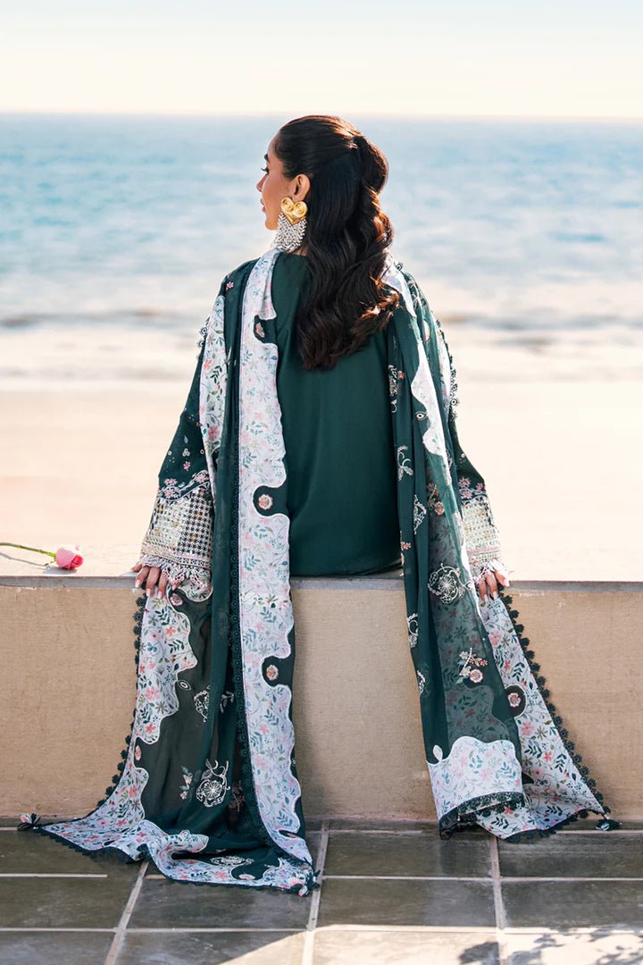 Model wearing deep green FK - 13 ELIZA dress from Qalamkar, a stylish Pakistani lawn suit perfect for summer clothes and lawn suits in the UK.