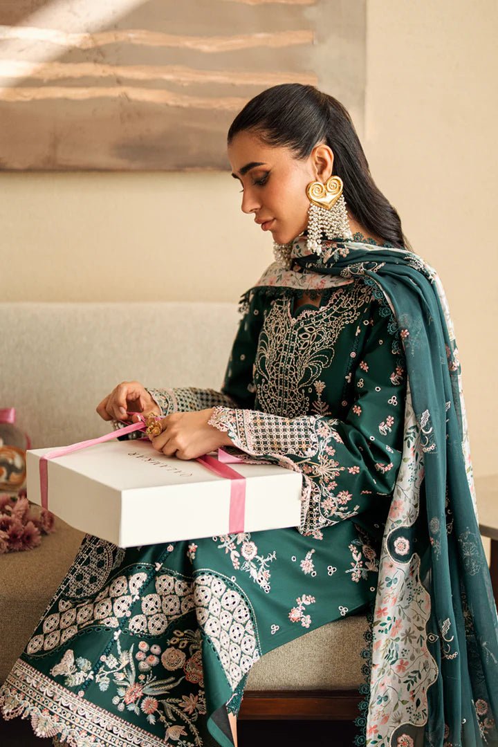Model wearing deep green FK - 13 ELIZA dress from Qalamkar, a stylish Pakistani lawn suit perfect for summer clothes and lawn suits in the UK.