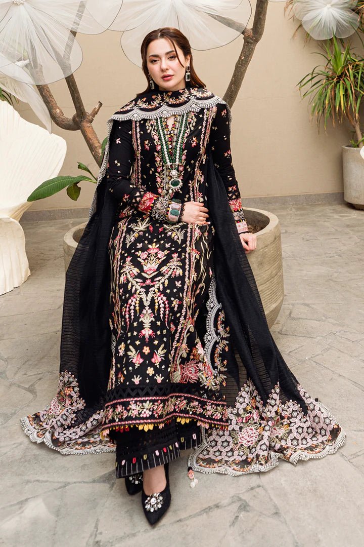 Model wearing black FK - 15 HANNAH dress from Qalamkar, a stylish Pakistani lawn suit perfect for summer clothes and lawn suits in the UK.