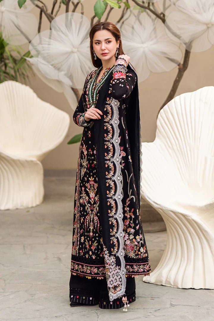 Model wearing black FK - 15 HANNAH dress from Qalamkar, a stylish Pakistani lawn suit perfect for summer clothes and lawn suits in the UK.