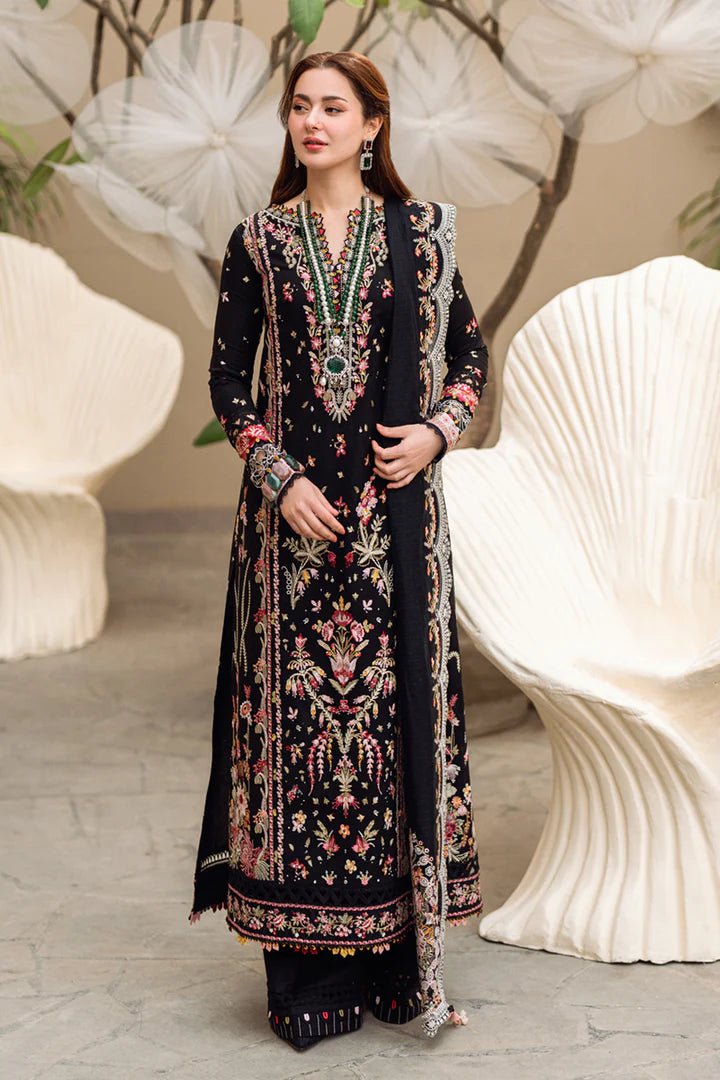 Model wearing black FK - 15 HANNAH dress from Qalamkar, a stylish Pakistani lawn suit perfect for summer clothes and lawn suits in the UK.