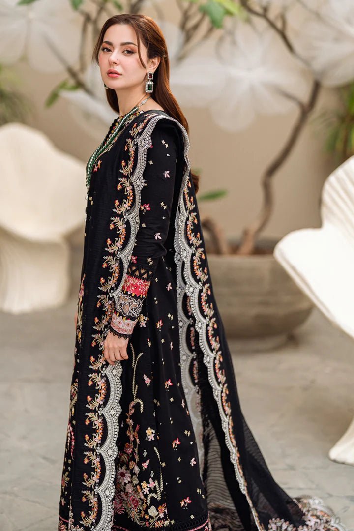 Model wearing black FK - 15 HANNAH dress from Qalamkar, a stylish Pakistani lawn suit perfect for summer clothes and lawn suits in the UK.