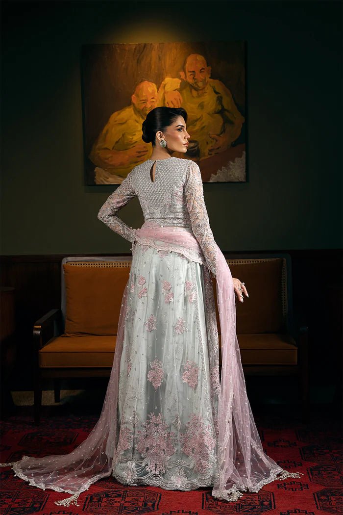 Model wearing KYLO - SRF - D - 04 from Saira Rizwan's Festive Unstitched collection in elegant blue. Luxury pret, festive, Pakistani clothes online in UK.