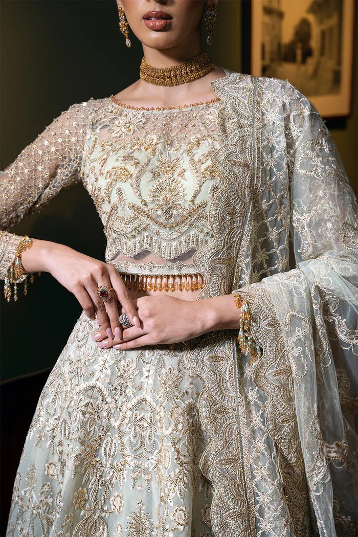 Model wearing LUCENT - SRF - D - 02 from Saira Rizwan's Festive Unstitched collection in soft peach. Luxury pret, festive, Pakistani clothes online in UK.