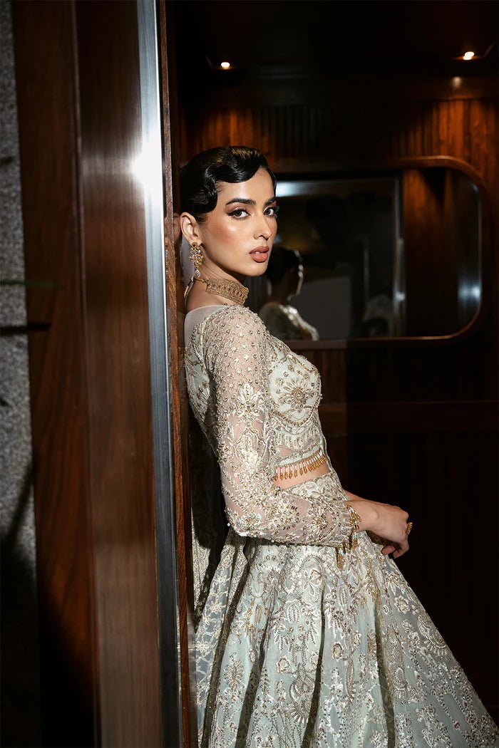 Model wearing LUCENT - SRF - D - 02 from Saira Rizwan's Festive Unstitched collection in soft peach. Luxury pret, festive, Pakistani clothes online in UK.