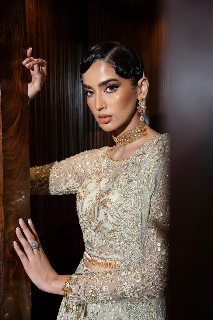 Model wearing LUCENT - SRF - D - 02 from Saira Rizwan's Festive Unstitched collection in soft peach. Luxury pret, festive, Pakistani clothes online in UK.