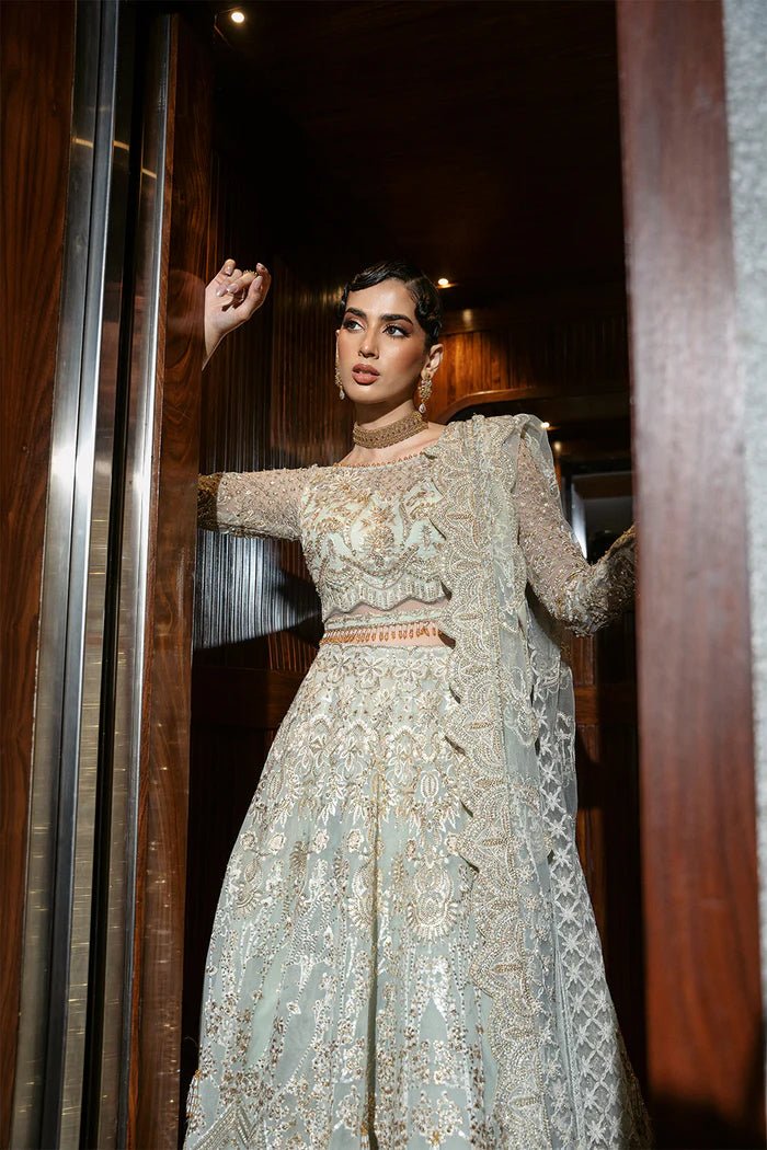 Model wearing LUCENT - SRF - D - 02 from Saira Rizwan's Festive Unstitched collection in soft peach. Luxury pret, festive, Pakistani clothes online in UK.